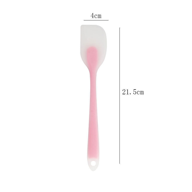 One-piece cream silicone scraper