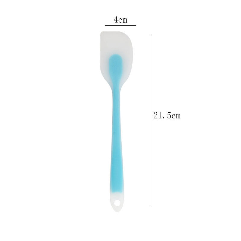 One-piece cream silicone scraper