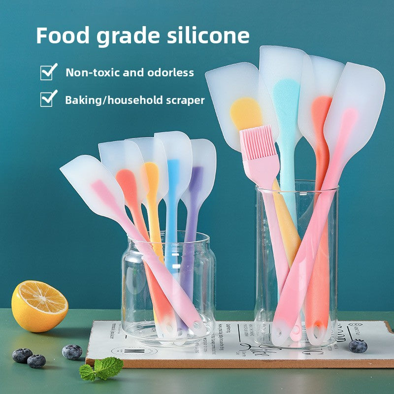 One-piece cream silicone scraper